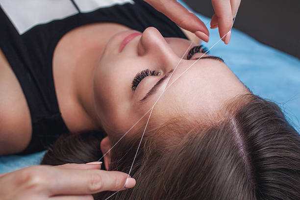 Professional eyebrow threading service at beauty salon in Aylesbury